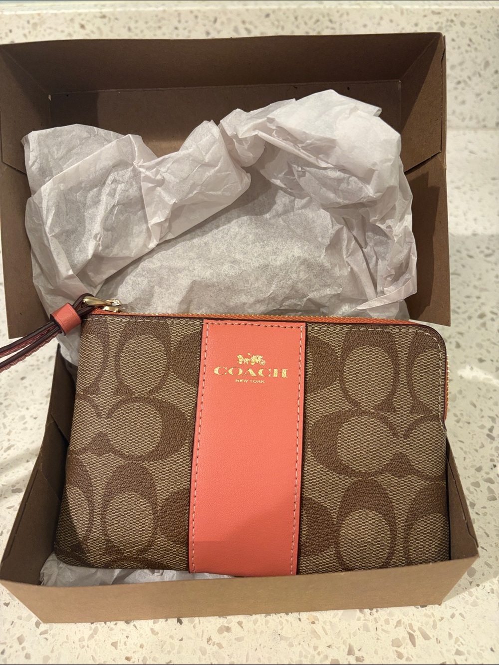 Coach Brown Signature Canvas Wristlet with Coral Stripe
